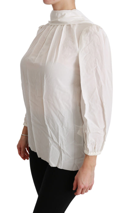 Elegante blusa de seda blanca con cuello alto