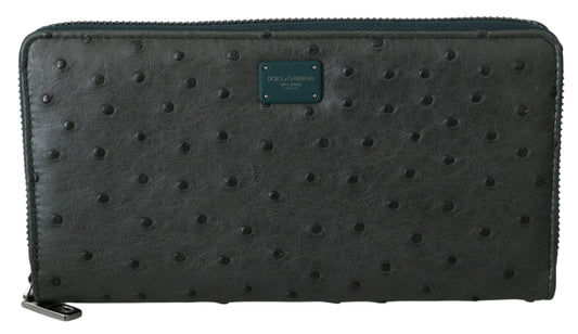 Exquisita cartera continental de piel de avestruz verde