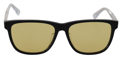 Elegantes gafas de sol de acetato negro con lentes amarillas