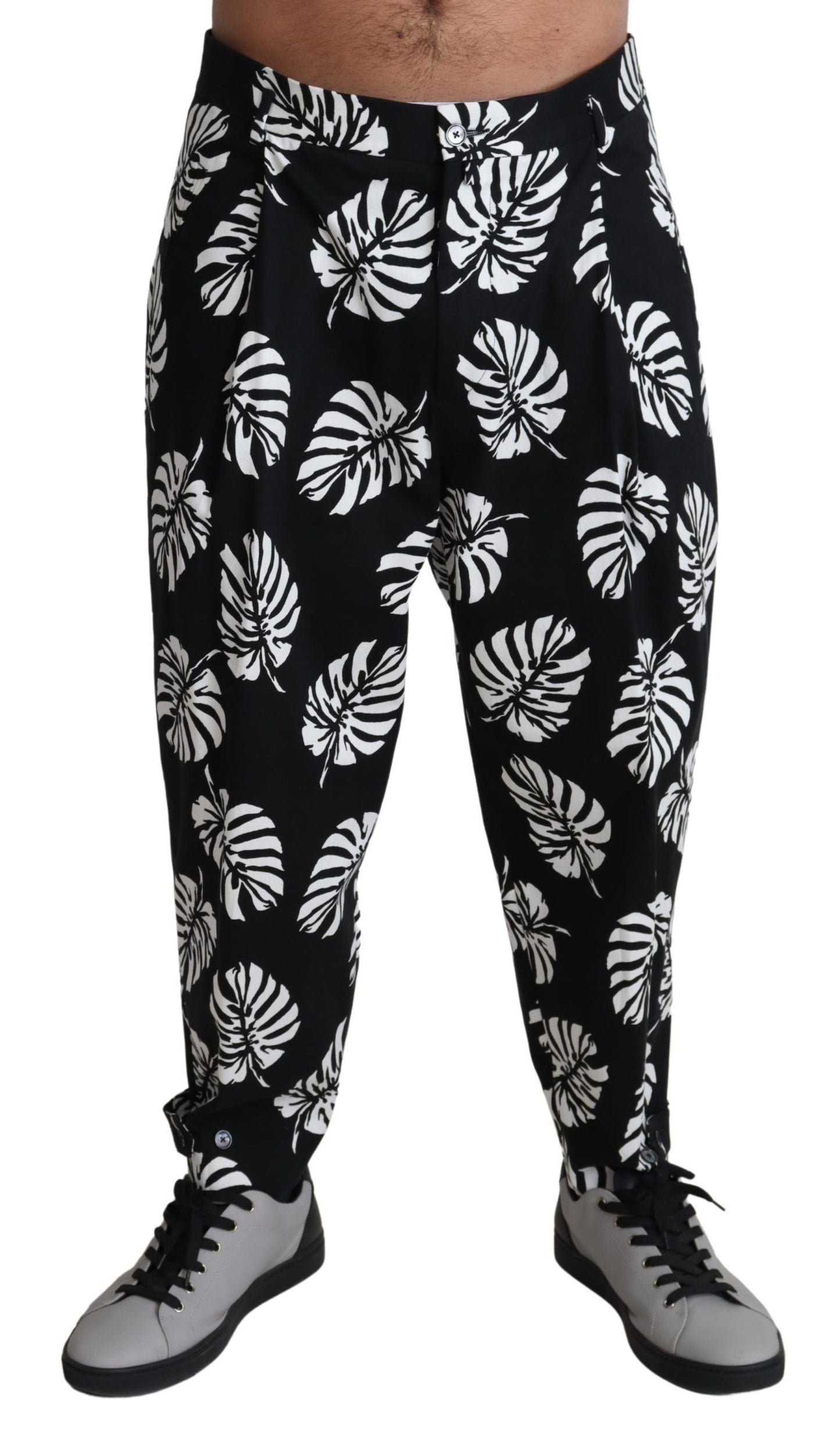 Pantalones elegantes de algodón con estampado de hojas de palmera