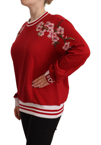 Elegante jersey rojo de cuello redondo con motivos florales