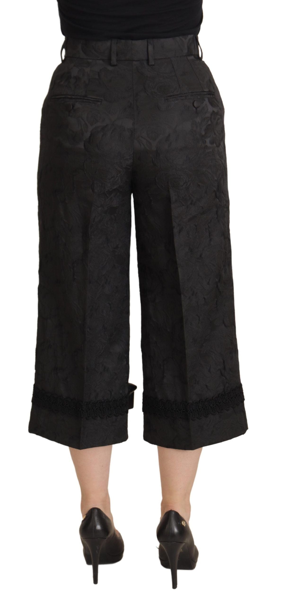 Elegantes pantalones negros con brocado