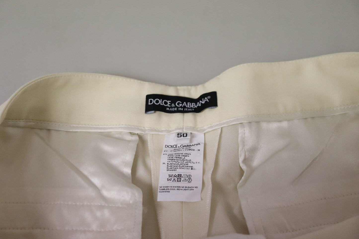 Elegantes pantalones de lana marfil de talle alto