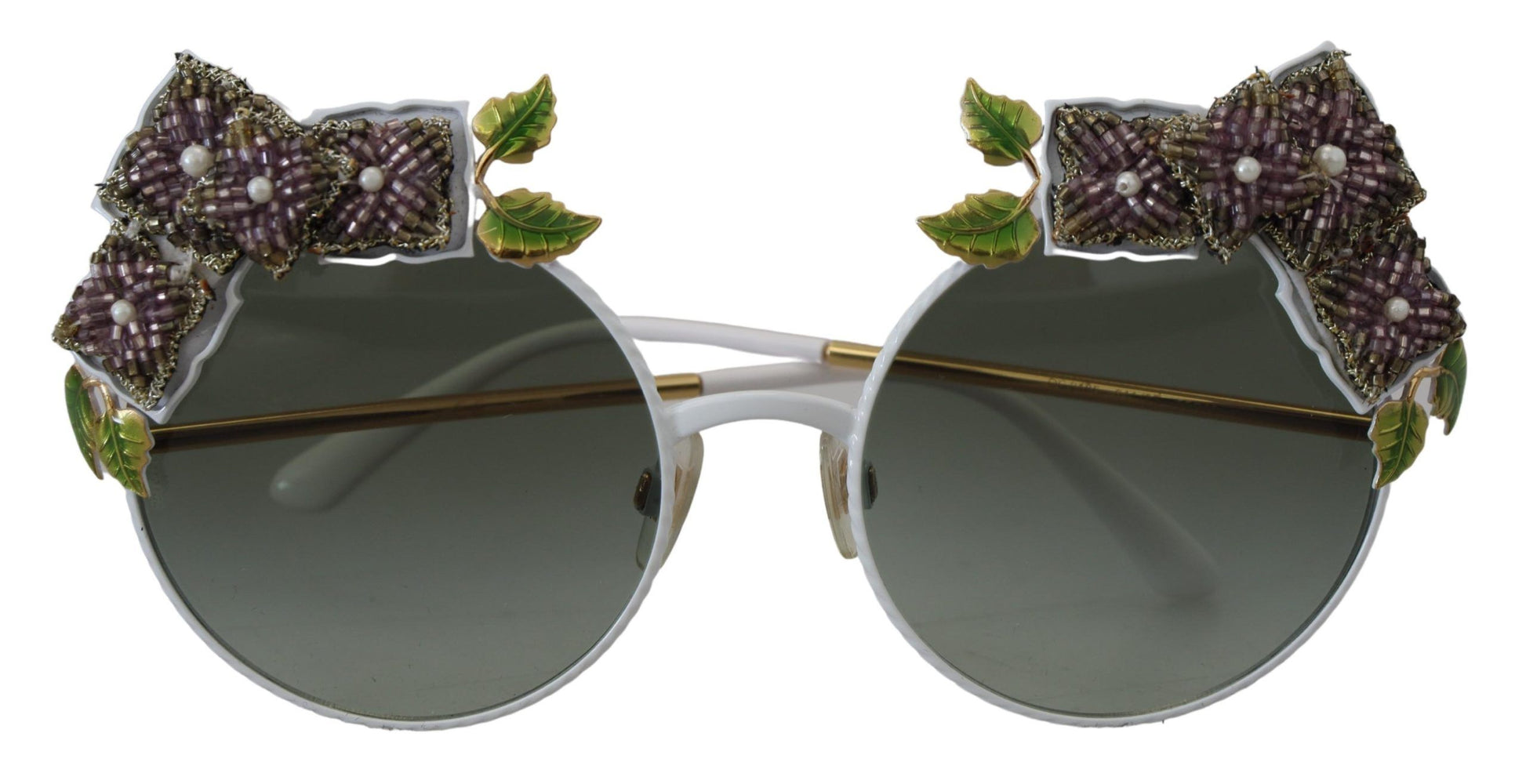 Elegantes gafas de sol doradas con adornos florales