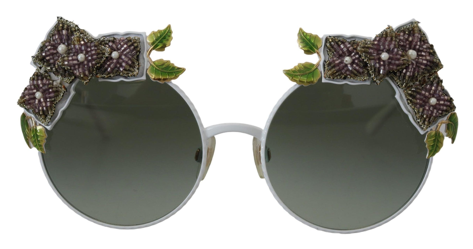 Elegantes gafas de sol doradas con adornos florales