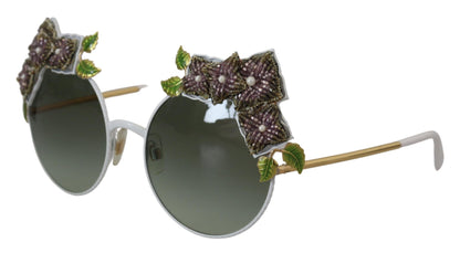 Elegantes gafas de sol doradas con adornos florales