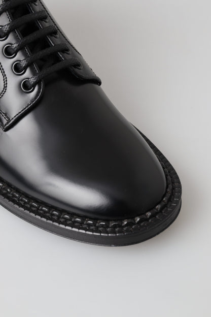 Botas elegantes de cuero negro para hombre