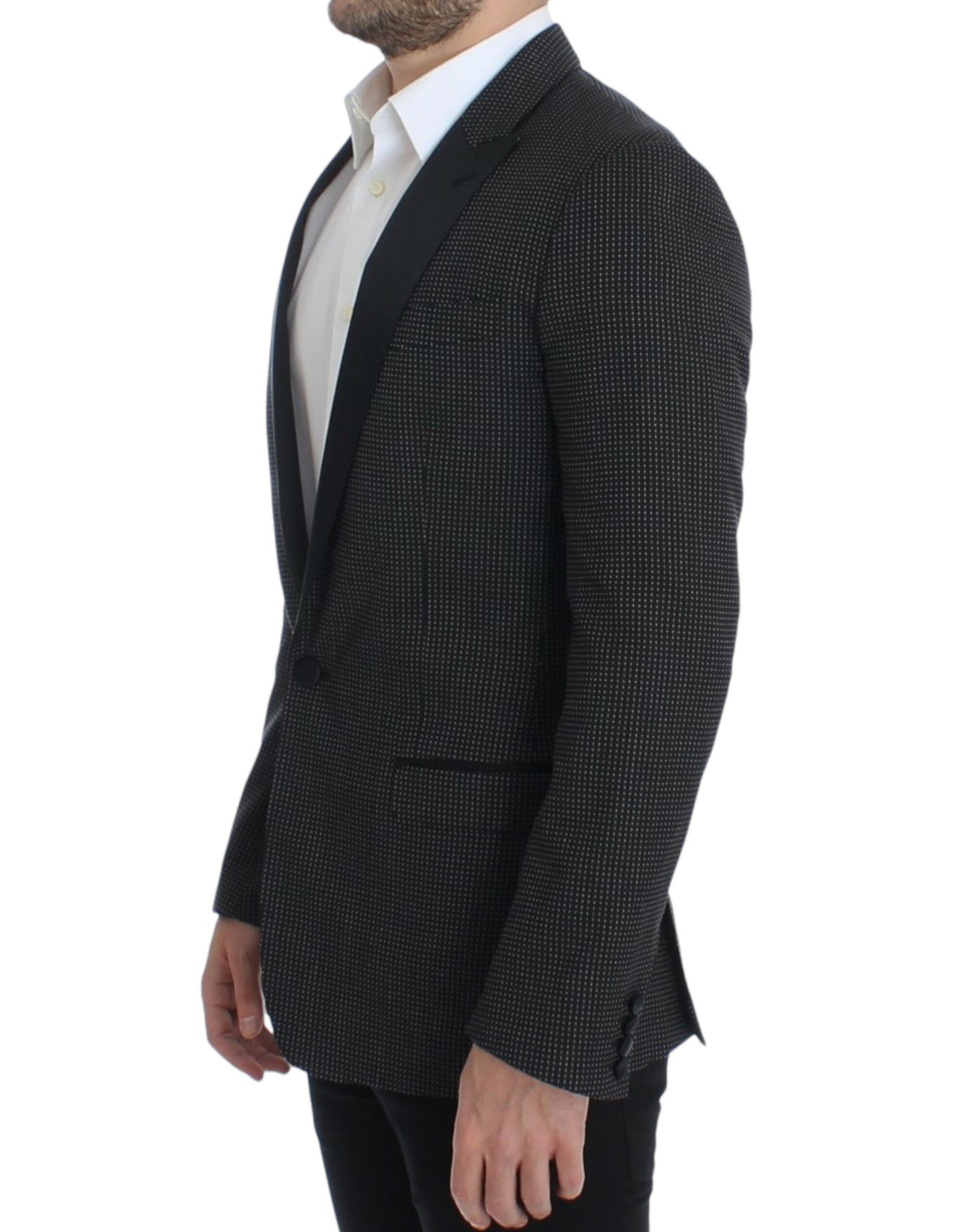 Elegante blazer ajustado con lunares negros