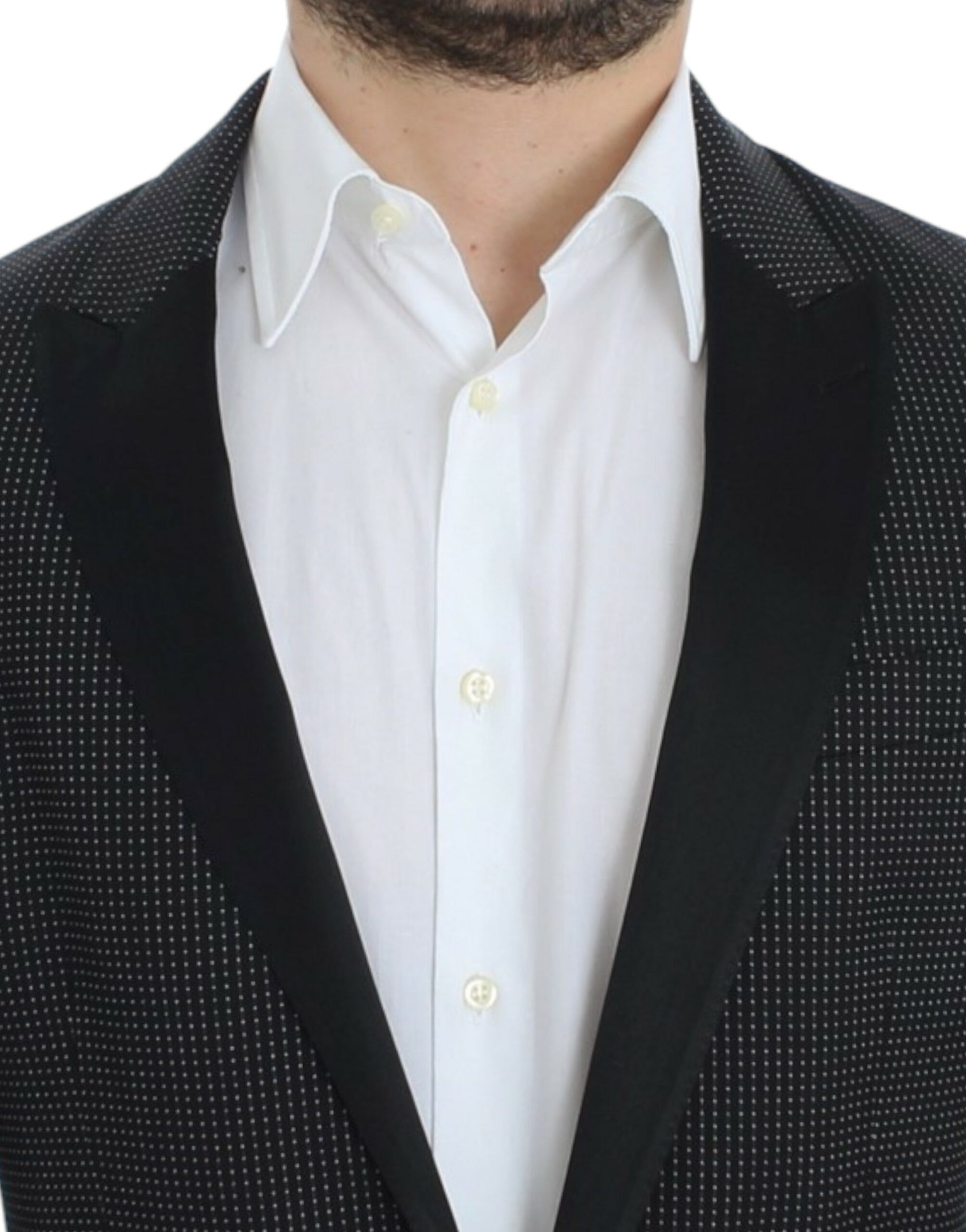 Elegante blazer ajustado con lunares negros