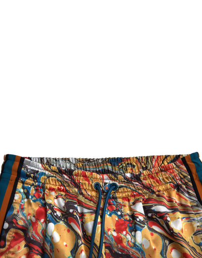 Elegante pantalón deportivo de satén en mármol multicolor