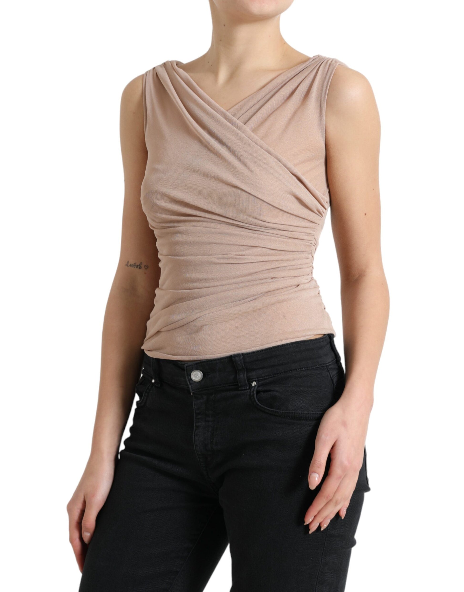 Elegante camiseta de tirantes beige sin mangas y cuello en V