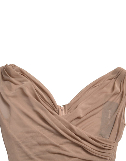 Elegante camiseta de tirantes beige sin mangas y cuello en V