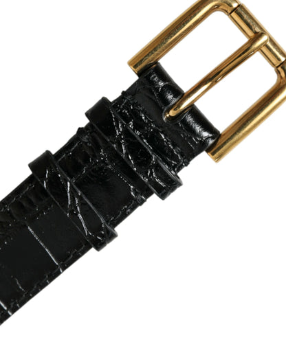 Elegante pulsera de cuero negro y dorado