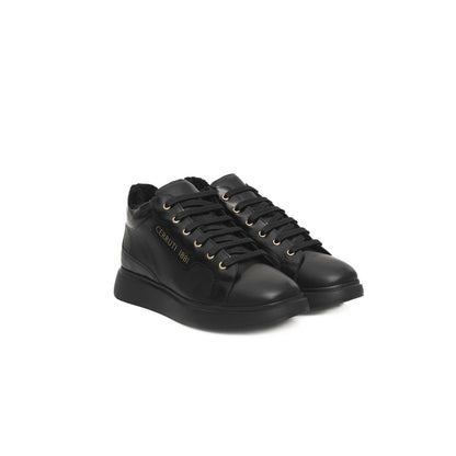 Zapatillas de piel negras para mujer