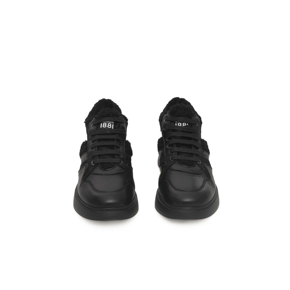 Zapatillas de piel negras para mujer