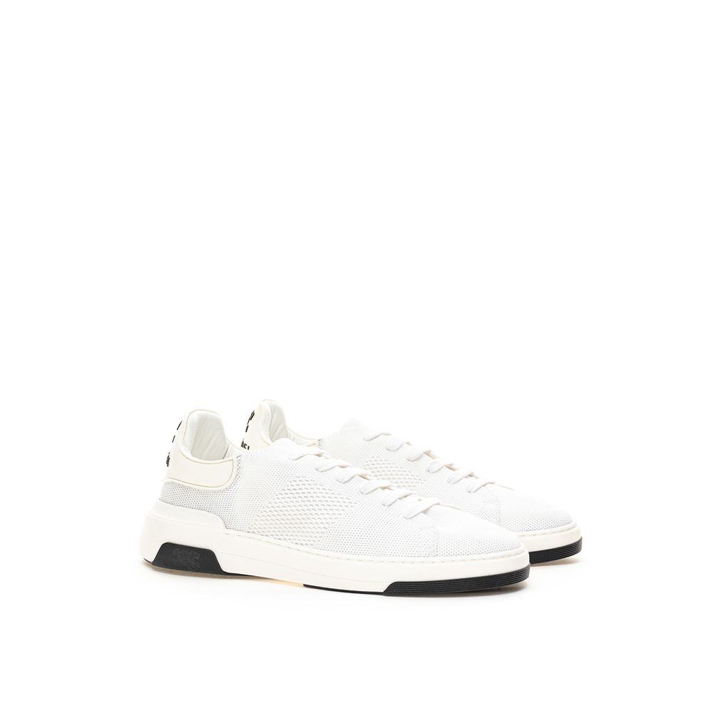 Elegantes zapatillas de piel blanca