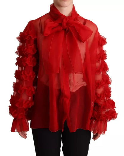 Blusa de seda roja con cuello Ascot y volantes