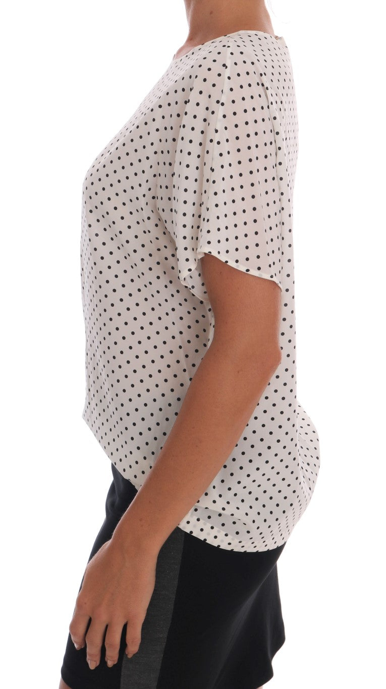 Blusa elegante de seda con lunares