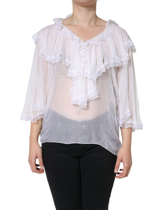 Blusa de manga larga con encaje y volantes blancos