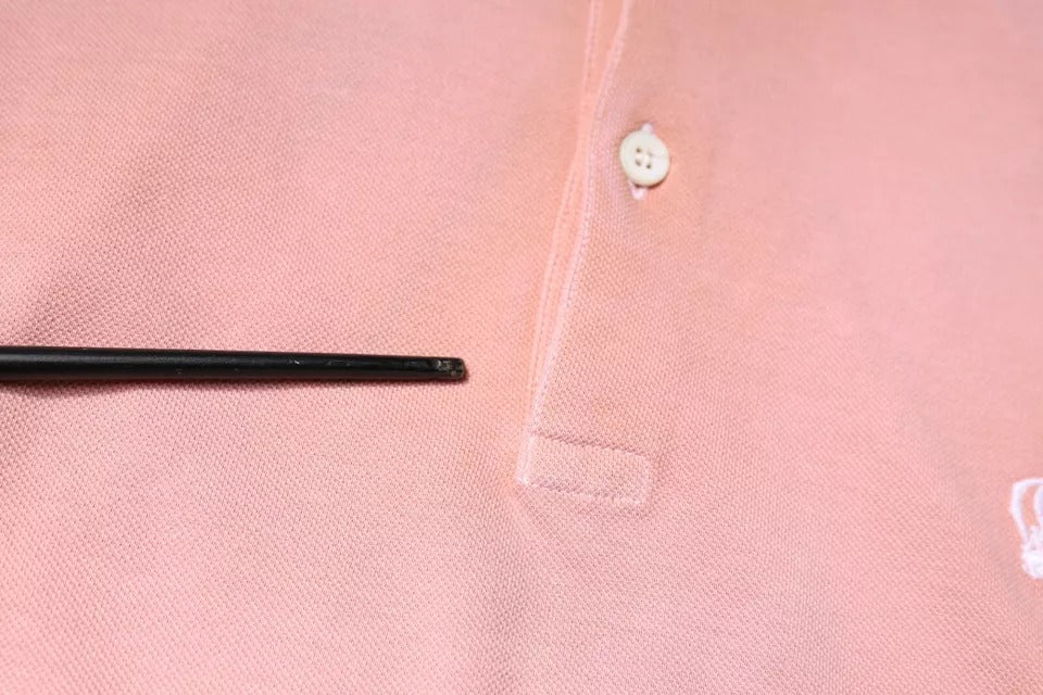 Polo de manga corta con cuello corona rosa