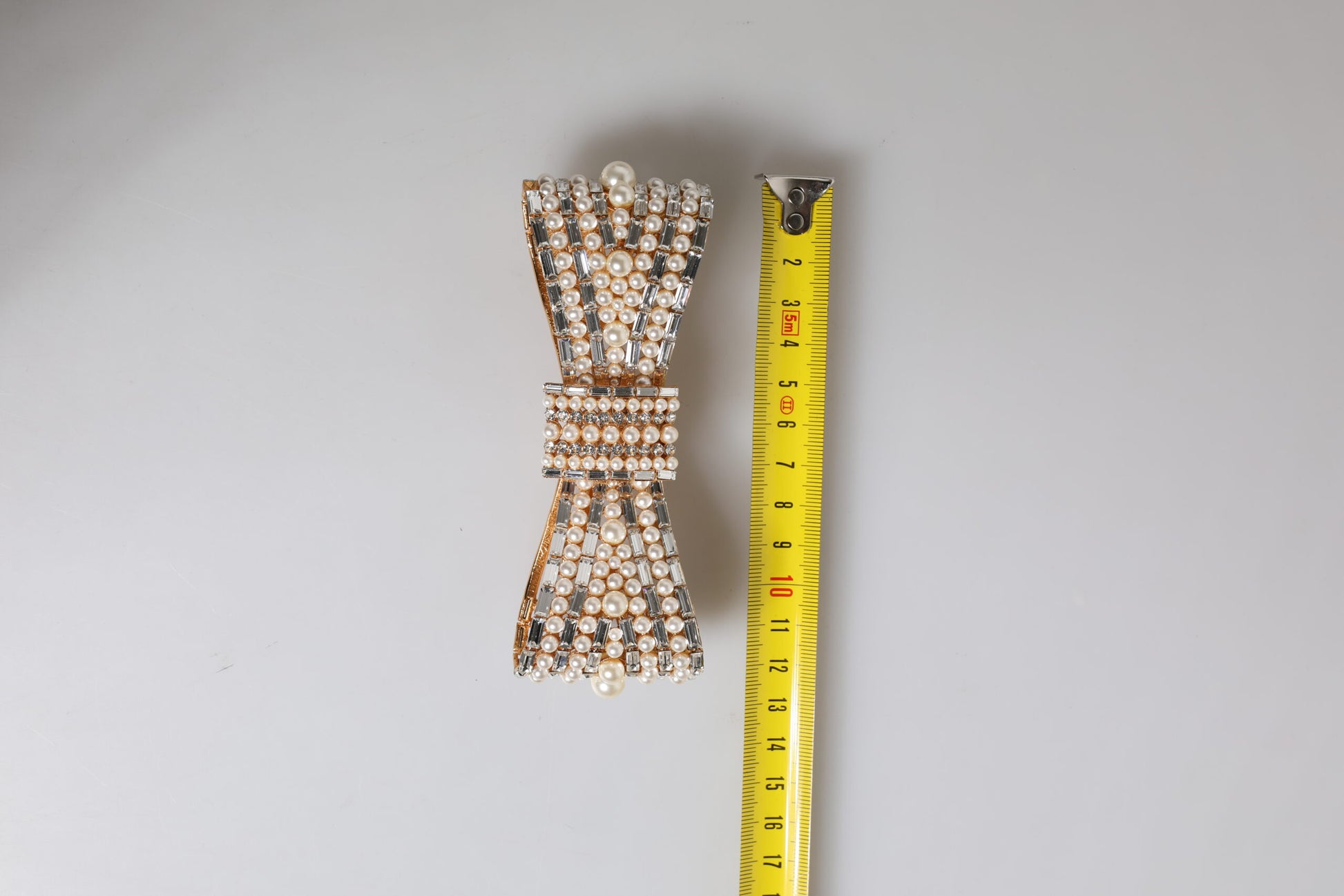 Gold Tone Brass Bow Crystal FauxPearl Embellished Brooch