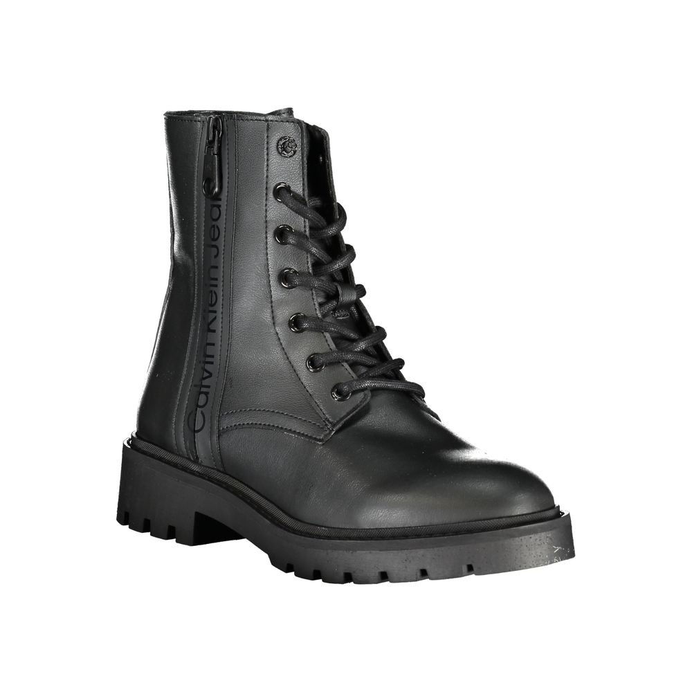 Botín negro chic con cordones y detalle de cremallera