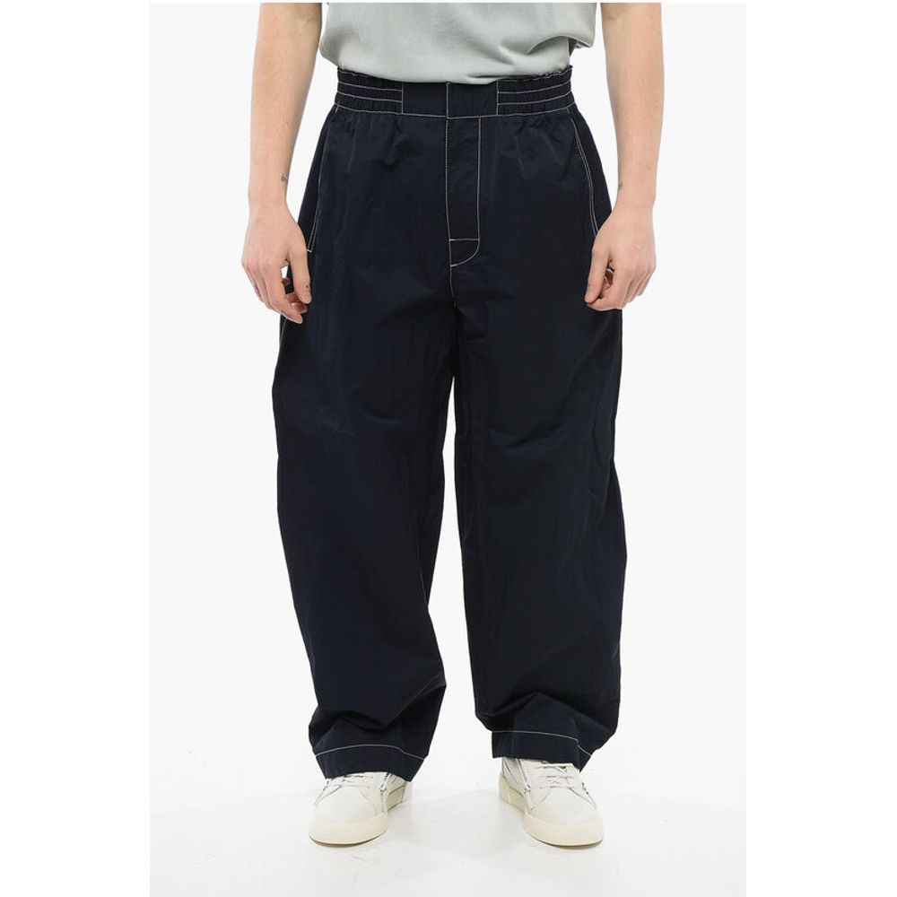 Tech Nylon Baggy Pants with Visible Stitchings