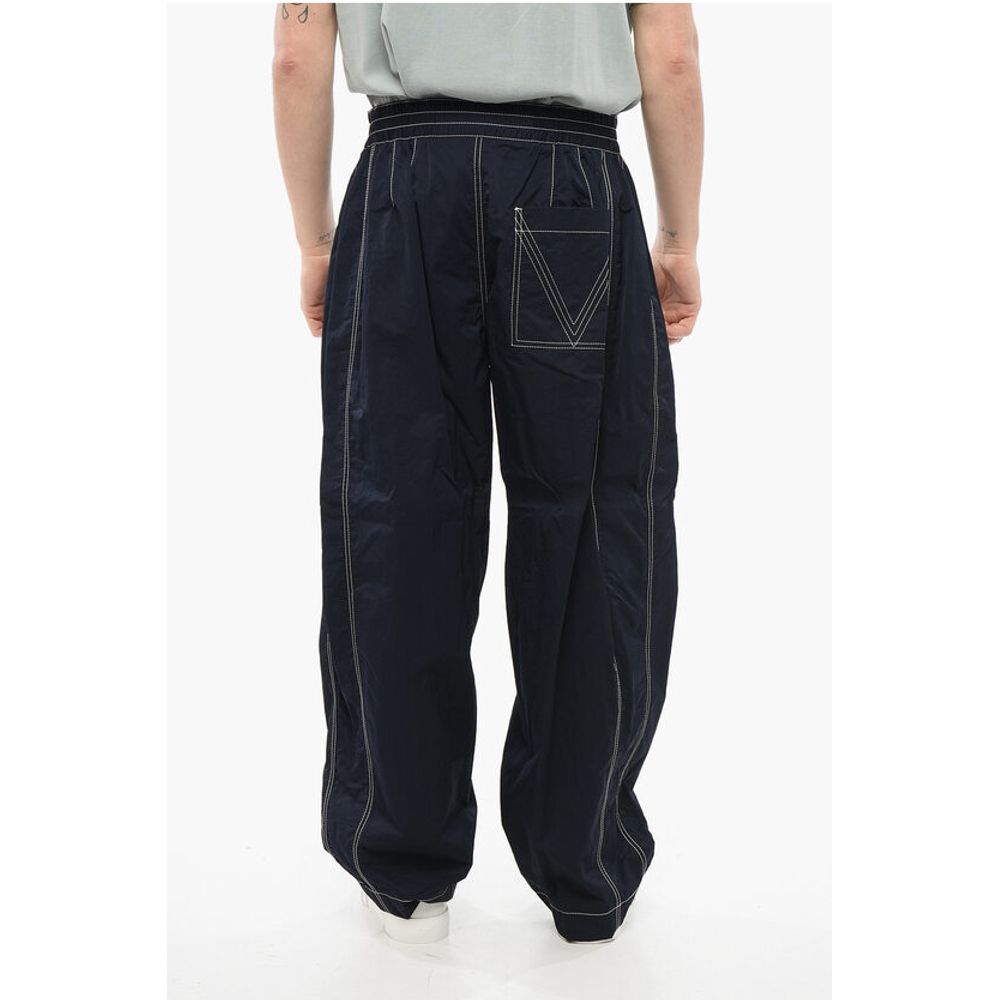 Tech Nylon Baggy Pants with Visible Stitchings