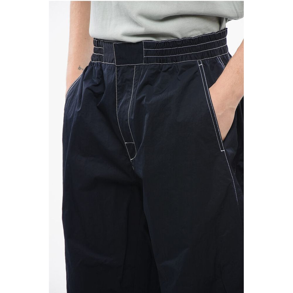 Tech Nylon Baggy Pants with Visible Stitchings