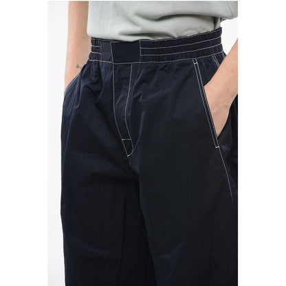 Tech Nylon Baggy Pants with Visible Stitchings