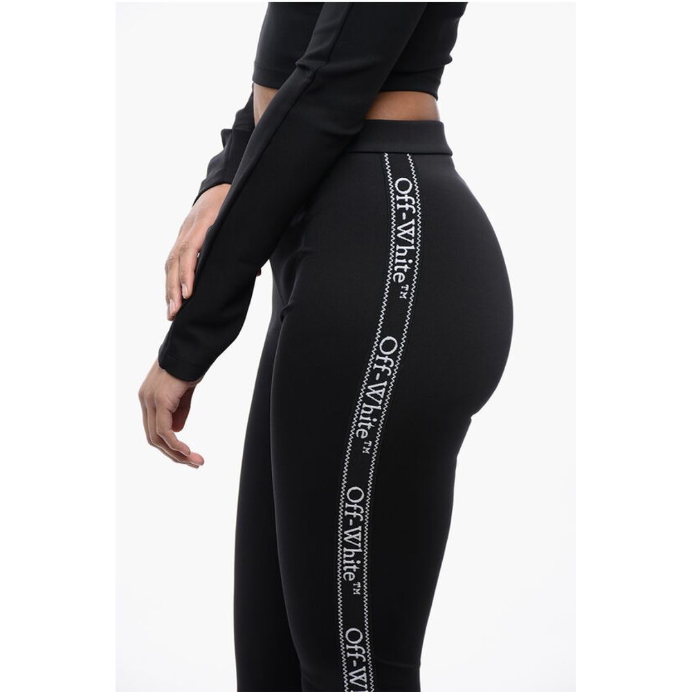 Solid Color Leggings with Side Logoed Band and Ankle Slit