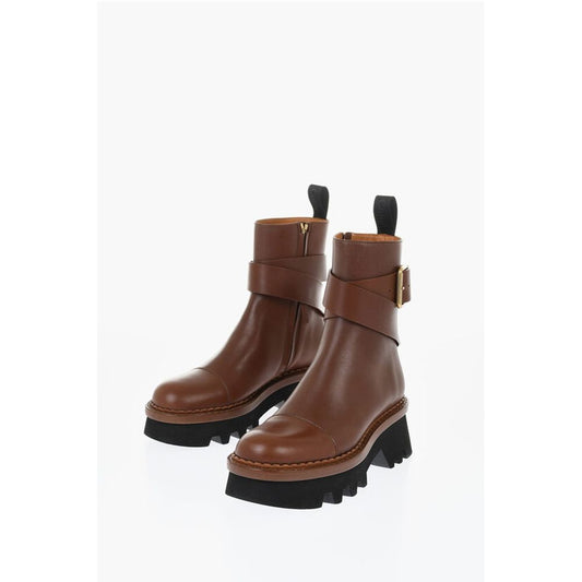 Leather Boots With Buckle Detail And Tank Sole