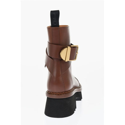 Leather Boots With Buckle Detail And Tank Sole