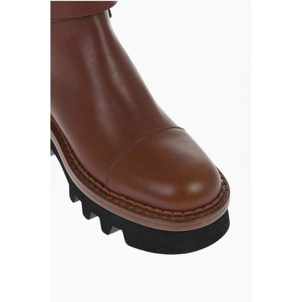 Leather Boots With Buckle Detail And Tank Sole