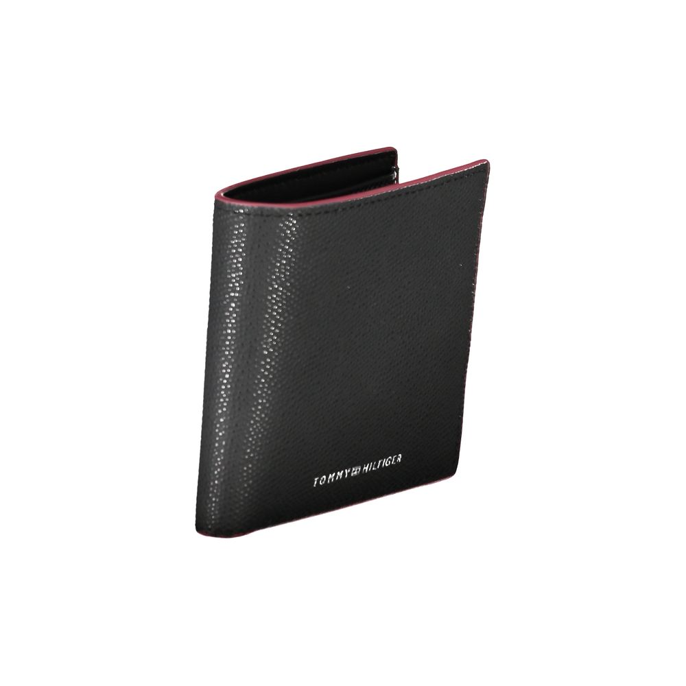 Elegante cartera de piel negra