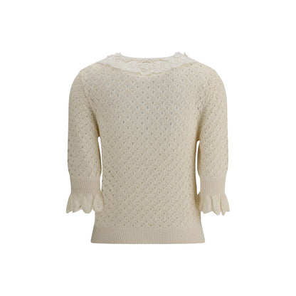 Sweater with lace collar