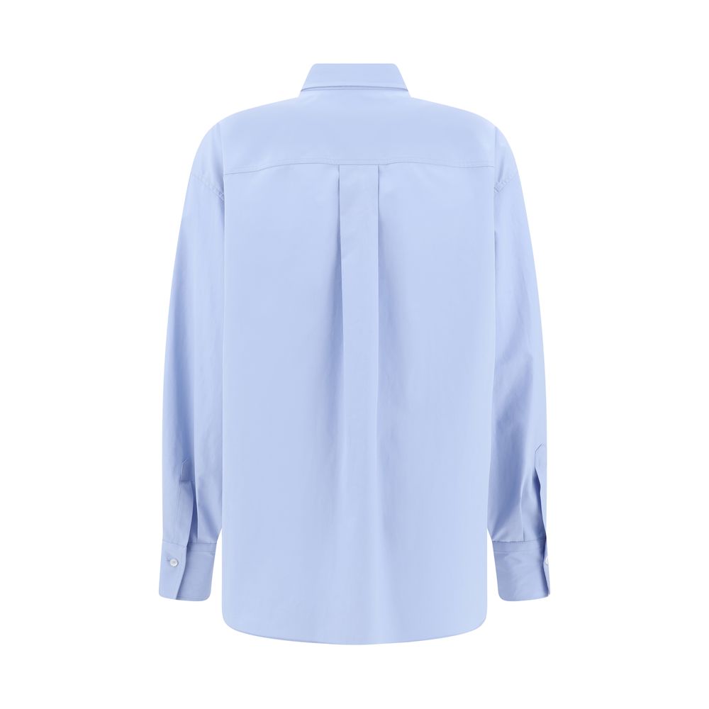 Shirt with iconic jewelry detail