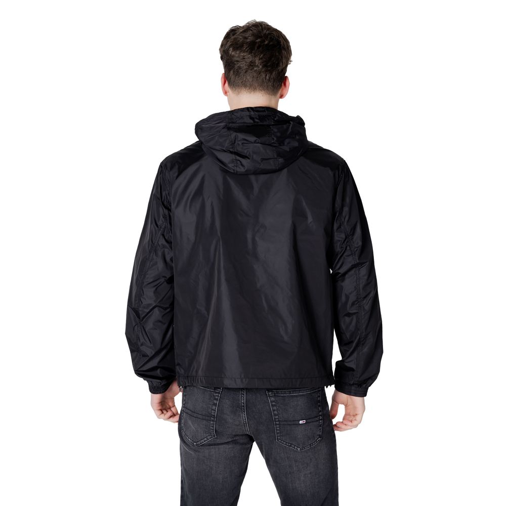 Chaquetas y abrigos de poliamida negra