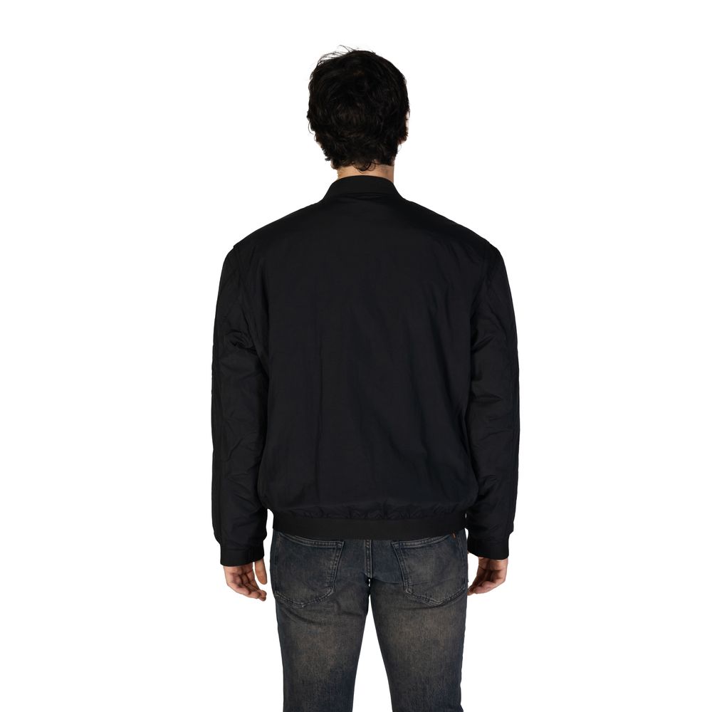 Chaquetas y abrigos de poliamida negra