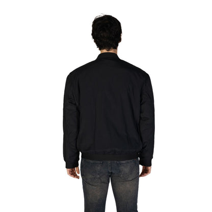 Chaquetas y abrigos de poliamida negra